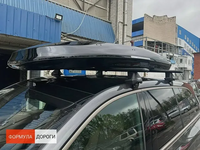 ENROAD на Lixiang L9: автобокс ENROAD Nomadix Pro XXL Slim 450-E, цвет «Чёрный» — дополнительный ракурс автомобиля с установленным автобоксом